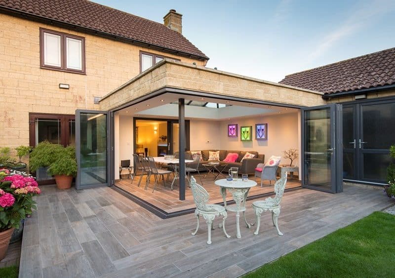 corner bifold doors showing a low track with flush floors in a house