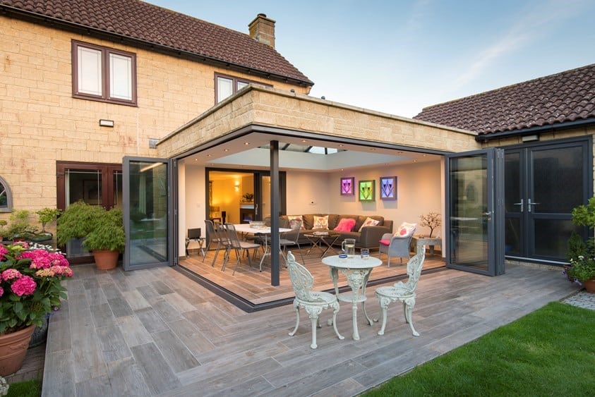 corner bifold doors showing a low track with flush floors in a house