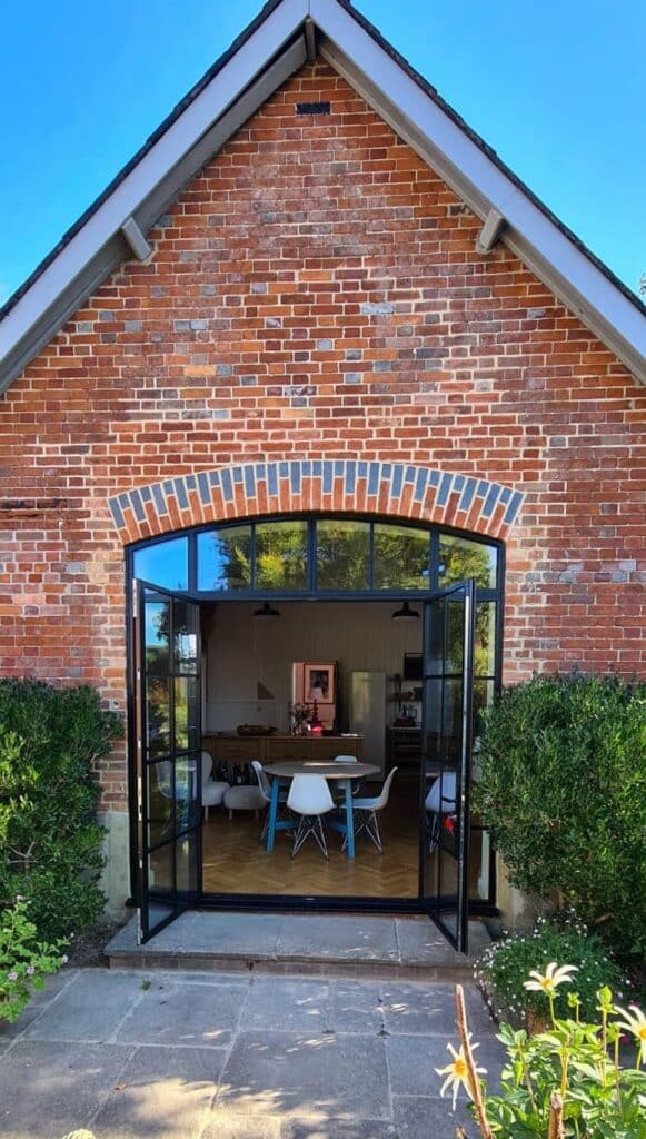 steel look doors in wiltshire open with a kitchen view
